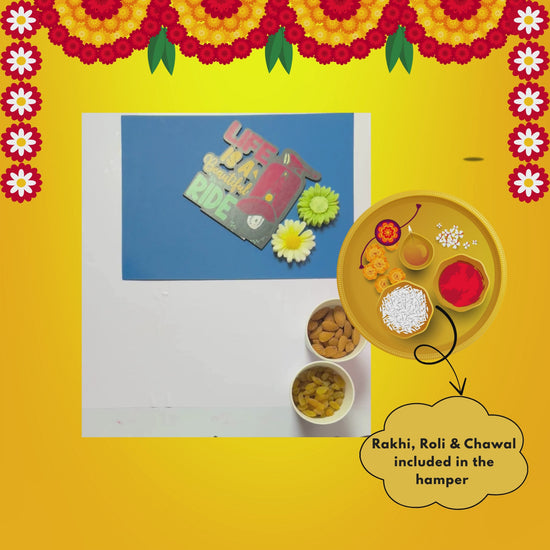 Snackkfit Rakhi Gift Hamper – Dry Fruits, Ladoos, Rakhi Card & Candle
